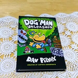 Unleashed Dog Man by Dav Pilkey, Scholastic, color-illustrated comic